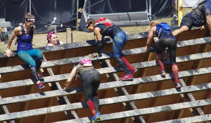 Participants take on the backside of the slip wall.