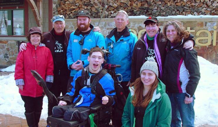 Nick Cerrato along with the Adaptive Sports Program at Mountain Creek Team headed for the Sugar Slop to Ski. Back row: Nick&#x2019;s Mom, Patti Cerrato, John Whiting, Tim Stone, Mike Holt, Buffy Whiting, Eileen Andreassi. Front: Nick Cerrato and Caryn Balacky.
