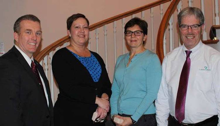 President and CEO Tom Shara, right, stands with colleagues celebrating 10 years of service with Lakeland Bank. Standing left to right is Joe Dolan, Patricia Colie and Caroline von Bistram.