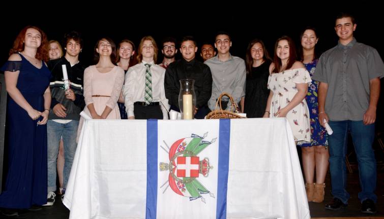 Newly indu cted members of the Italian Honor Society revel in the recognition for excellence.