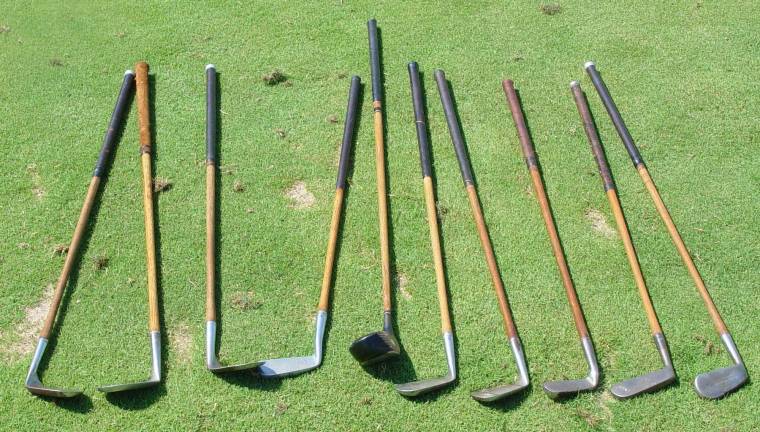 Antique hickory golf clubs used by golfers in the Macallan Hickory and Scotch Tournament on the par 3 4th hole.