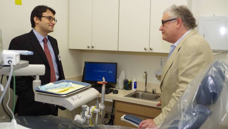 Affordable medical and dental care comes to Sussex County Between Chief Dental Officer Dr. Sam Wakim and dentist Dr. Michael Robinson is a computer terminal that is state of the art.