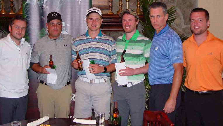 The team of Matthew Myers, Dan Maher, Ed Barrett and Joe Livsey receive their 1st place prize from GM Mark Melillo and Event Coordinator Ryan Delaney.