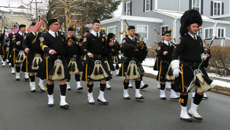 The Morris County Police Pipes &amp; Drums lead the procession, this year&#xfe;&#xc4;&#xf4;s 12th Annual Sussex County St. Patrick's Day Parade.