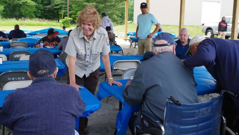 U.S. Fish &amp; Wildlife Service employee Fran Stephenson is shown enjoying a bit of levity with veterans from Paramus in Bergen County during the lunch break.