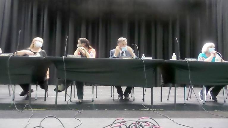 From left: Pat Lutfy, Jessica Decker, vice-president; Jack Fisher, president; and Rosemary Walsh (Photo by Frances Ruth Harris)