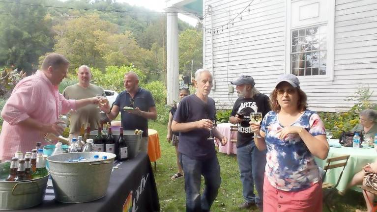 Guests enjoyed hors d’oeuvres, wine, and beer (Photo by Frances Ruth Harris)