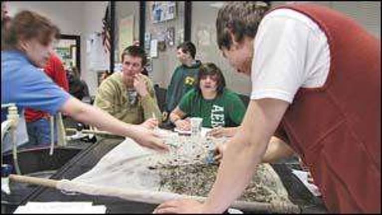 Environmental science students learn about local streams first-hand Environmental science students learn about local streams first-hand