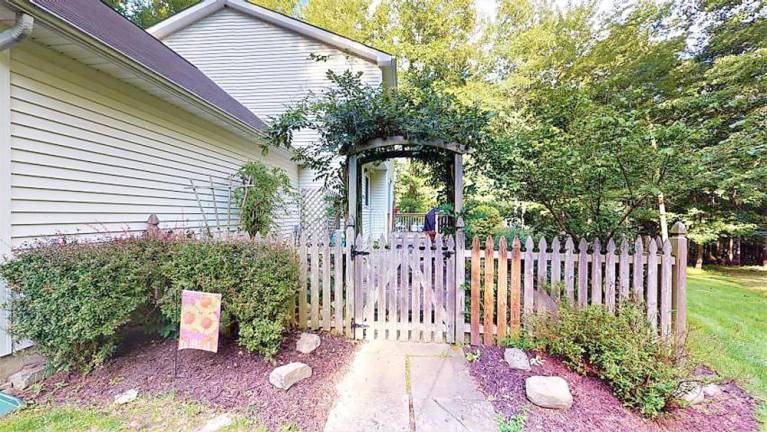 Three-bedroom colonial has large private yard and more