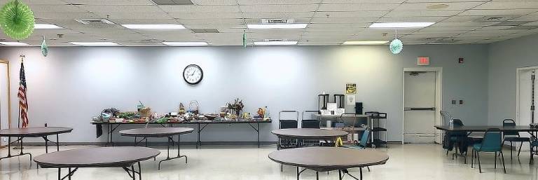 The blank wall at the Vernon Township Senior Center before the mural was painted.