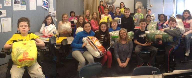 Area schools take part in recycling contest Helen Morgan Middle School students in Sparta are shown with recycling materials.
