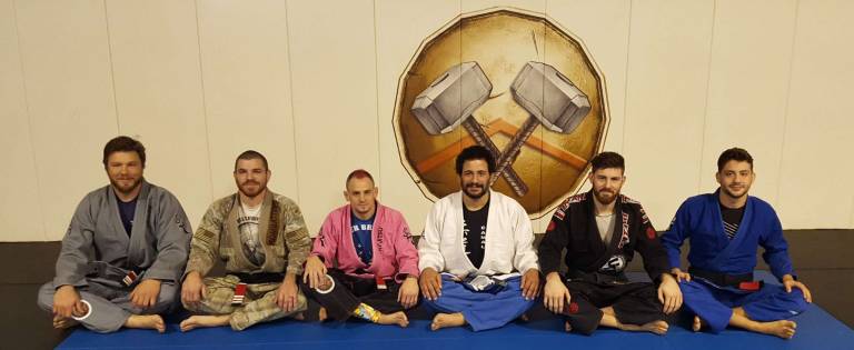 Local martial arts gyms unite for charity Black belts are: from, left, Dan Miller, Jim Miller, Sean Santella, Jamie Cruz, Andy Main, Mike Main.