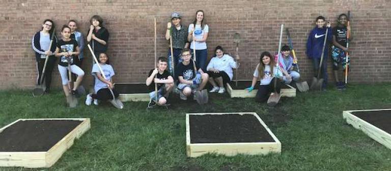 Middle-schoolers construct garden