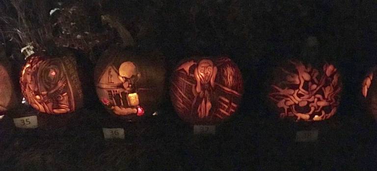 Wallkill Valley wins contest Finished pumpkins are lit up.