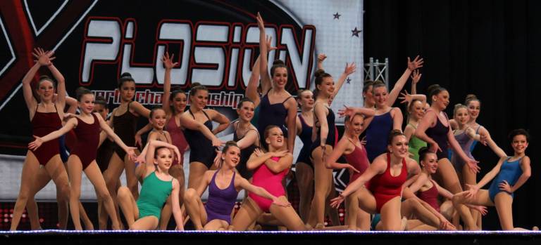 Dance Expression dancers succeed at competition The jazz dancers of "Flashdance" are shown in a final pose.