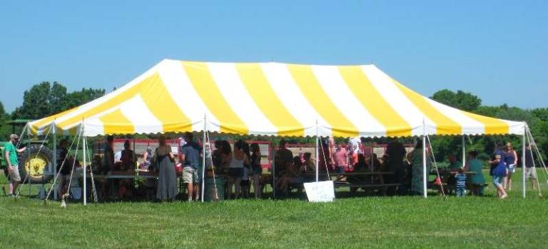 Patrons beat the heat and enjoyed concessions under the big tent