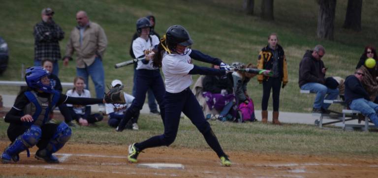 Vernon batter Ally Latham hits the ball in the championship game against Millburn.