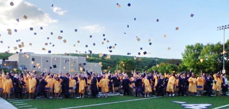 Jefferson sends off 2016 graduates Graduates toss their caps into the air at the conclusion of the graduation ceremony.