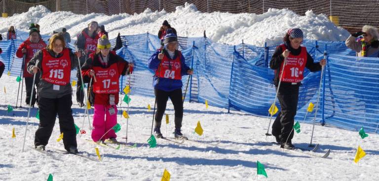 A group of four cross-country skiers is shown on the racecourse Tuesday at Mountain Creek.