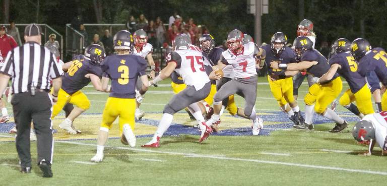 High Point quarterback Alex Buchwald is on the run with the ball in the second half