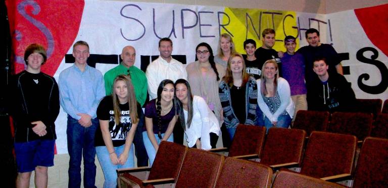 Wallkill Valley Regional High School FBLA members hosted a school-wide assembly on Wednesday, Nov. 4, to kicked off the school&#xfe;&#xc4;&#xf4;s March of Dimes event&#xfe;&#xc4;&#xee;Super Night 2015. Mr. Art DiBenedetto, Vernon schools Superintendent and the 2015 Skylands March for Babies Co-Chairman (third from left), Mr. Scott Hoffman, March of Dimes Ambassador (fourth from left), and Mrs. JoAnn Bartoli, the March of Dimes Senior Community Director of the North Jersey Divison (fifth from right), joined FBLA members by encouraging the student body to participate in Super Night for healthier babies.