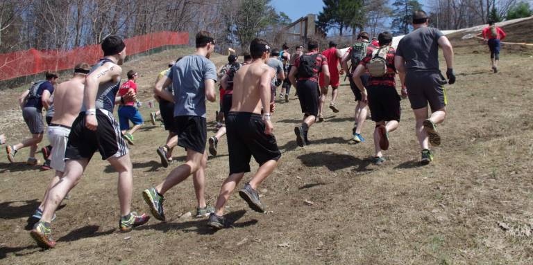 Heading up the mountain is one of the last groups of starters at the Spartan Race held on Saturday at Mountain Creek South.
