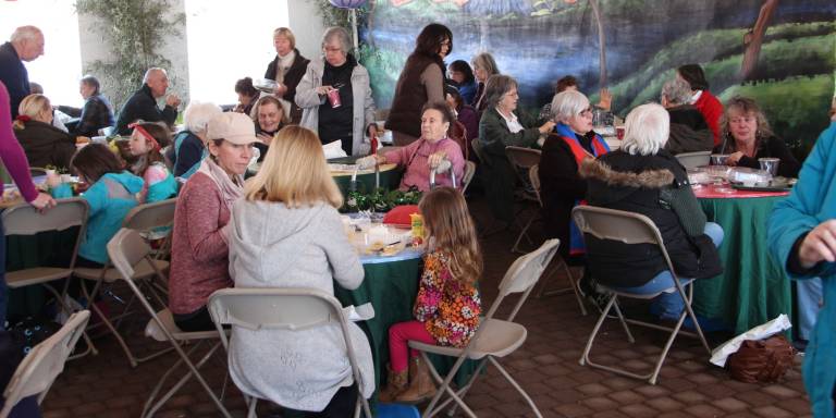 Attendees at Springfest enjoy a meal.
