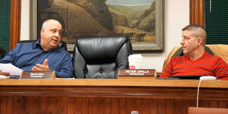 From left, Mayor Steve Ciasullo explains why the DPW should flush and test the Ogdensburg hydrants to Councilman Peter Opilla, on right.