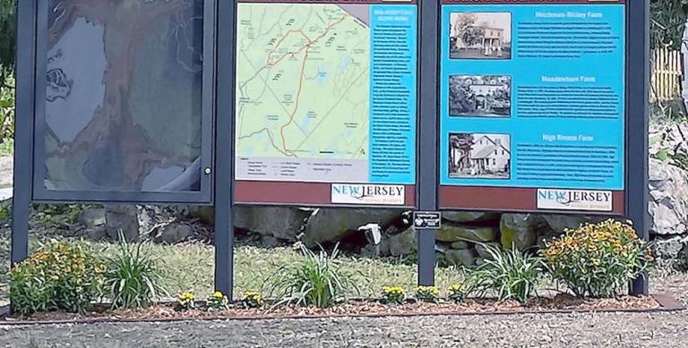 The new Western Highlands Scenic Byway sign was dedicated on August 21 at the Valley Farmers Cooperative Farm