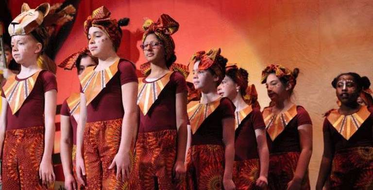 It’s not just the performance Members of the chorus of “The Lion King Jr.” at the Monroe-Woodbury Middle School.