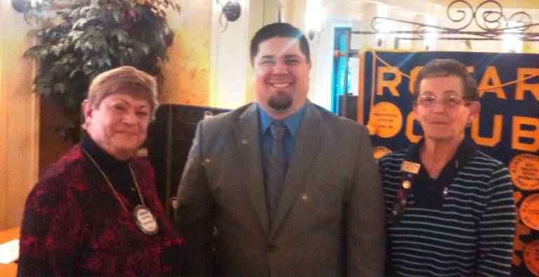 Pictured, from left, are Carolyn King,rotarian, Brian Quinn, Sharon Hosking Rotary Club president.