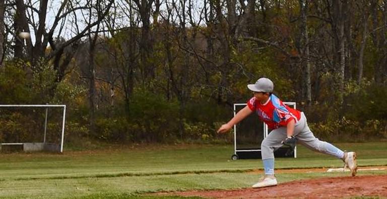 Wallkill Valley baseball team ‘strikes out’ cancer Christian Norris throws out the first pitch at Wallkill Valley Little League’s Strikeout Cancer event.