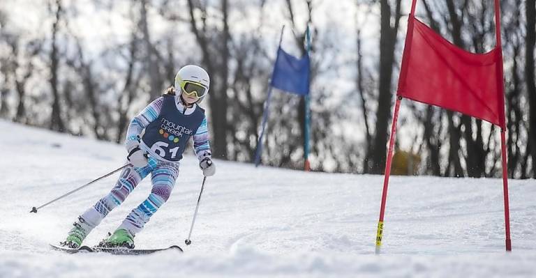 A skier speeds down the mountain during the 2nd Annual Hedda Memorial Race.