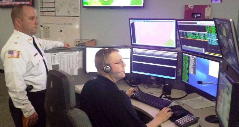 Photo provided Sussex County Sheriff Michael Strada, left, and Supervisor-Public Safety Telecommunicator Dave Korver are shown at one of the dispatch work stations at the&#xa0;Sussex County Sheriff's Department's new 911 Communications Center.
