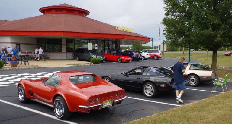 Corvettes surrounded the Chatterbox Drive-In with many owners opening their car&#xfe;&#xc4;&#xf4;s hoods for people to view the spotless engines.
