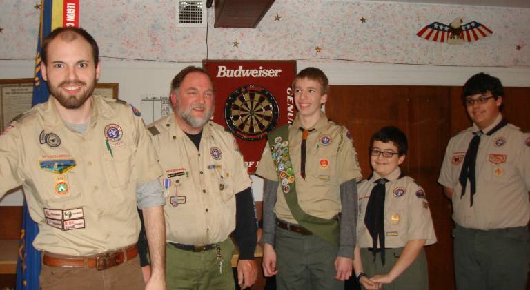From left, Assistant. Scoutmaster Tom Peterson, Jr., Scoutmaster Matt Edwards, Sr. Patrol Leader Christopher Peterson, Scout Christopher Malone and Scout George Pierce are shown in this photo.