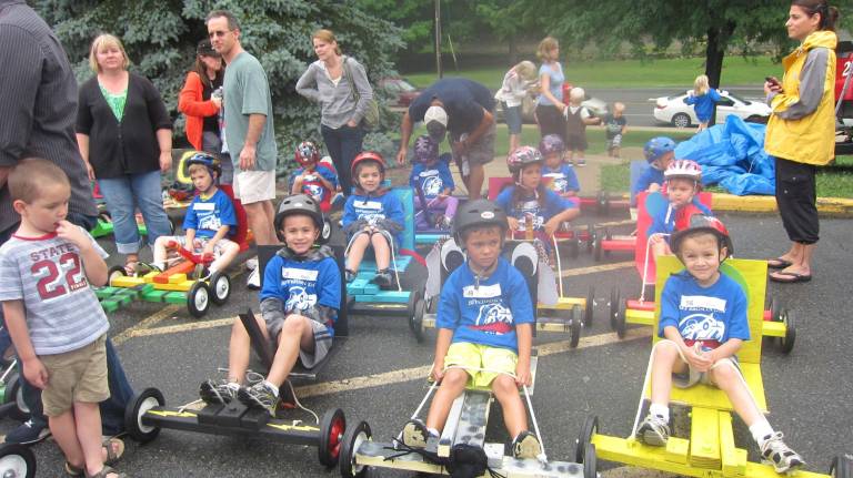 Karts race to return to Jefferson Day Kids and adults are shown during last year's kart race.