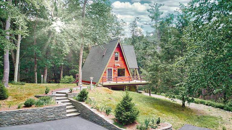 One-of-a-kind retreat on 13+ acres with trout stream