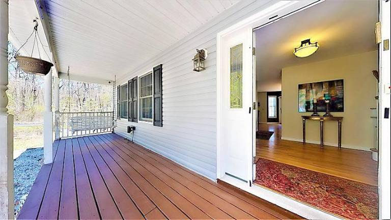 Modern four-bedroom colonial has room to roam Porch