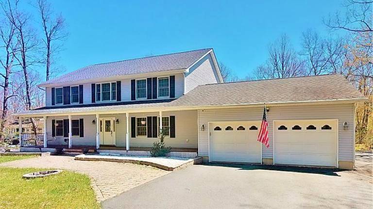 Modern four-bedroom colonial has room to roam Modern four-bedroom colonial has room to roam