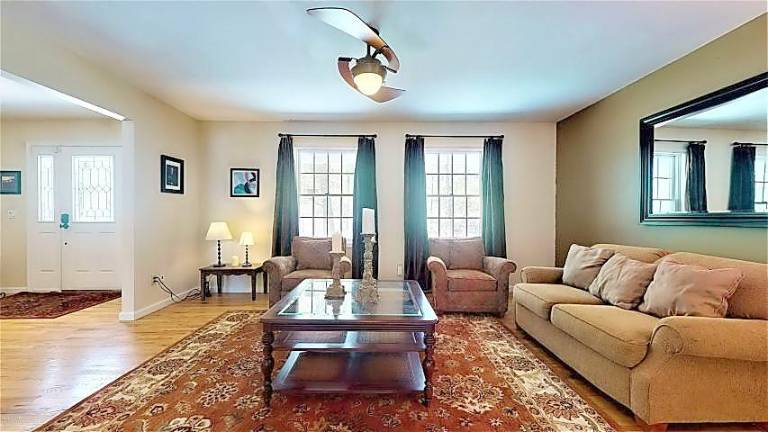 Modern four-bedroom colonial has room to roam Living room