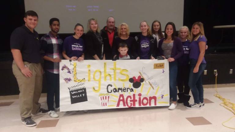 Wallkill Valley Regional High School FBLA members hosted a school-wide assembly on Wednesday, November 7, to kick-off the school&#x2019;s March of Dimes event for healthier babies&#x2014;Super Night 2018. Pictured from left: Co-President Zachery Dora, Vice President Harshil Bhavsar, Community Service Vice President Riley Cunniffe, March of Dimes Community Director Mrs. JoAnn Bartoli, March of Dimes Ambassadors Bill and Lisa Gordon with son Dylan, Community Service Vice President Hannah Sekelsky, Membership Vice President Emma McGuire, Secretary Francesca Ciasullo, Member Madison Gunderman, and Member Danielle Fetzner.