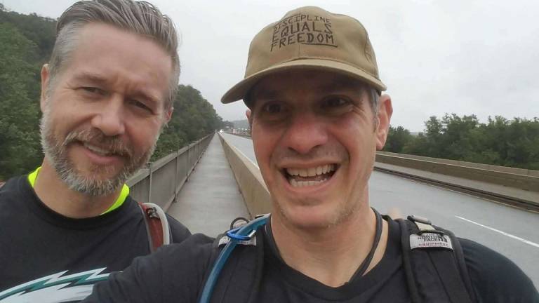 Tim Wright (left) and Jan Wright (right) at the start of their journey on the Rt 80 bridge at the Pa/NJ line of the Appalachian Trail.