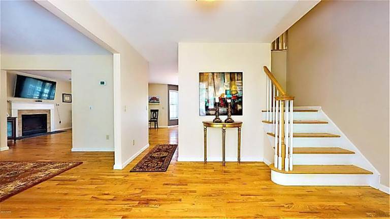 Modern four-bedroom colonial has room to roam Entry hall