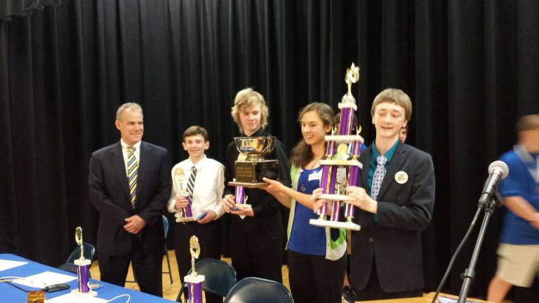 The Glen Meadow B team is shown with the trophy.