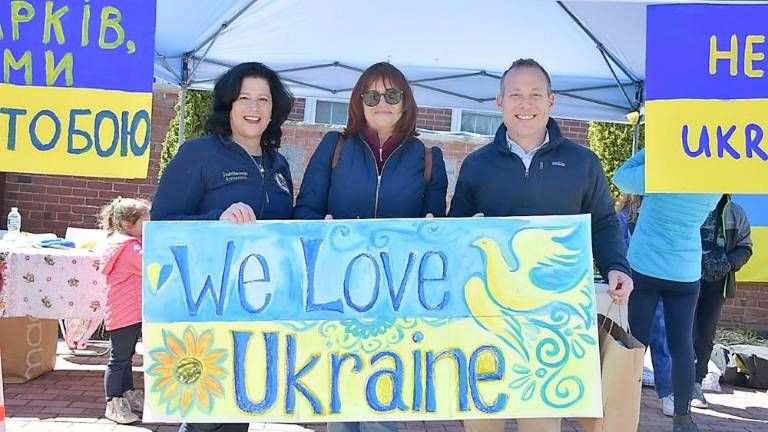 Below: Gottheimer with Fair Lawn Councilwoman Gail Rottenstrich and local community organizers.