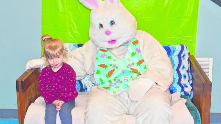 Eleanor Proefeta poses with the Easter Bunny at Hampton Township Fire &amp; Rescue’s pancake breakfast Sunday, March 10. (Photo by Maria Kovic)