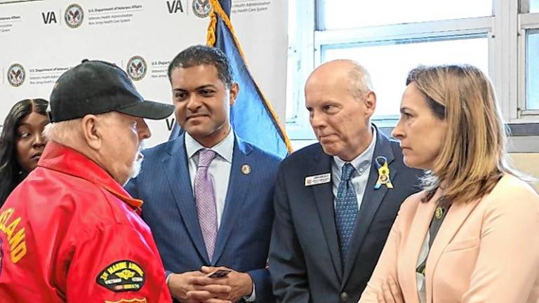 From left, a local veteran speaks with VA Undersecretary Shereef Elnahal, Morris County Commissioner John Krickus and Rep. Mikie Sherrill, D-11. (Photo provided)