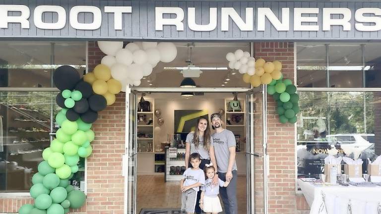 Matt Vilardo with his wife, Anastasia, and children, Joseph and Emma, at their new store (Photo provided by Matt Vilardo)