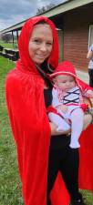 Caitlin Mazzaro, dressed as Little Red Riding Hood, holds her baby Aleia at Hardyston’s Halloween Spooktacular on Saturday, Oct. 28. (Photo by Ava Lamorte)